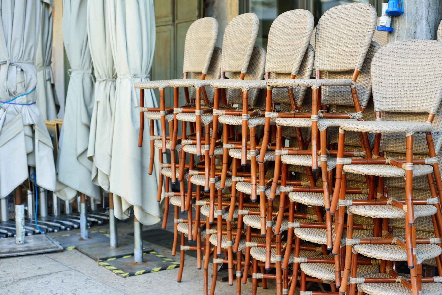 Stacked restaurant chairs — commercial cleanout